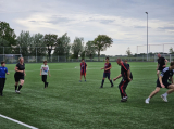 Laatste training S.K.N.W.K. JO11-1JM (partijtje tegen de ouders) van maandag 27 mei 2024 (26/137)